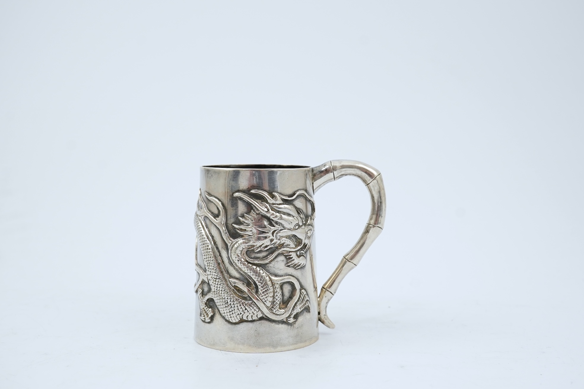 A late 19th/early 20th century Chinese Export silver small mug, by Wang Hing, Hong Kong